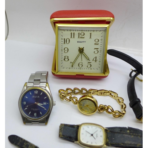 966 - A collection of wristwatches and a travel clock