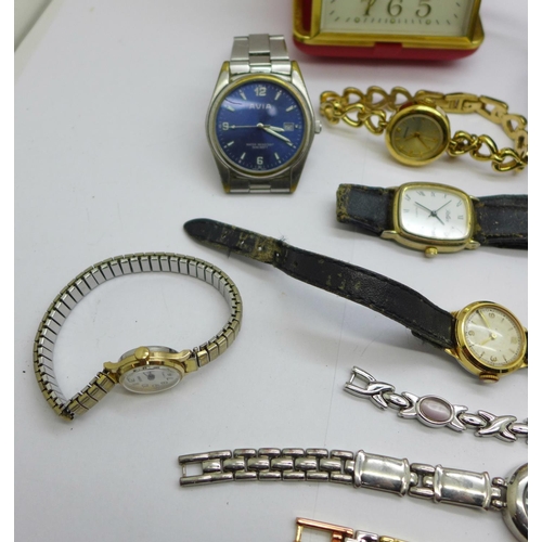 966 - A collection of wristwatches and a travel clock