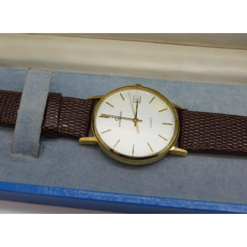 968 - A gentleman's 9ct gold Garrards quartz wristwatch, with box