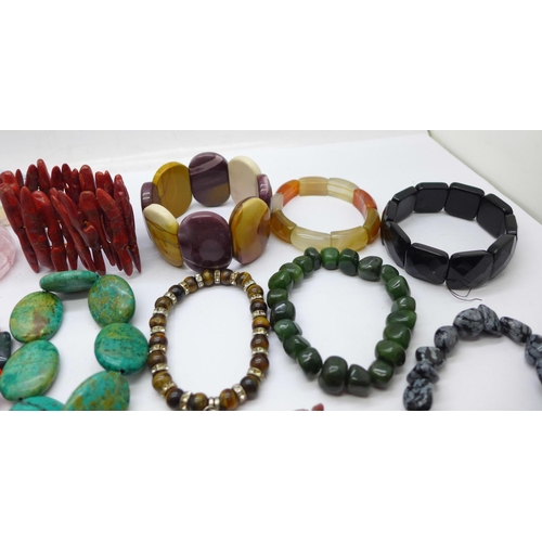 975 - Gemstone bracelets including opalite, coral, tigers eye, etc.