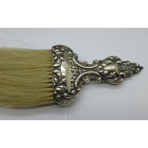 987 - Two silver backed brushes and a silver mounted brush, clothes brush a/f