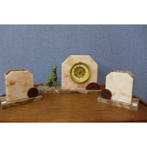 19 - An Art Deco marble clock garniture