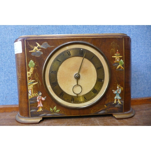 27 - A Japanned walnut mantel timepiece