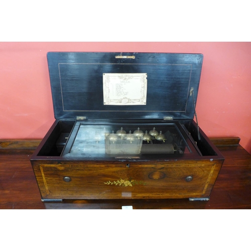 30 - A 19th Century Swiss inlaid rosewood 12 air cylinder music box, with 23cms h x 67cms w