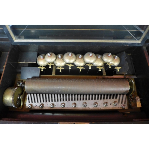 30 - A 19th Century Swiss inlaid rosewood 12 air cylinder music box, with 23cms h x 67cms w