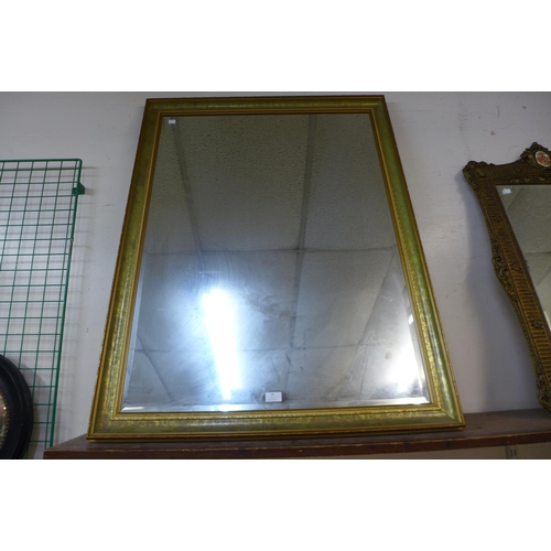 38 - A gilt framed mirror