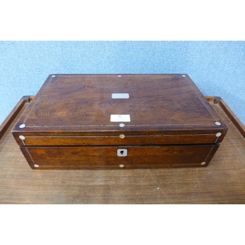 41 - A Victorian rosewood and mother of pearl inlaid writing slope