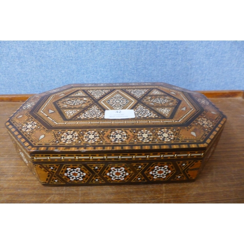 42 - A Moorish inlaid hardwood octagonal box