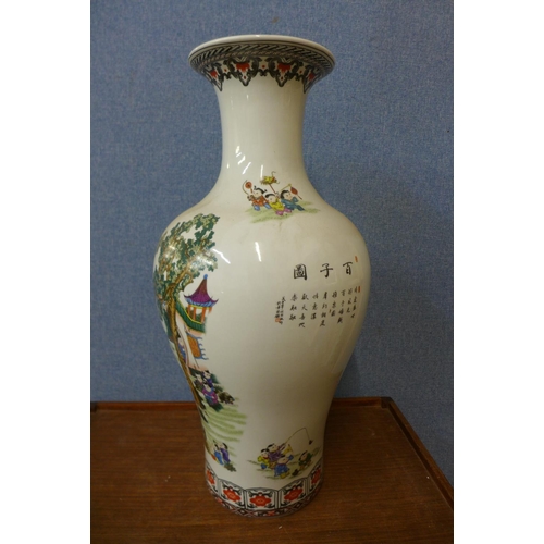 46 - A Chinese famille verte porcelain vase, 66cms h