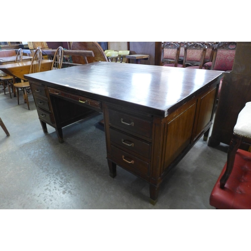 52 - An early 20th Century mahogany partner's desk