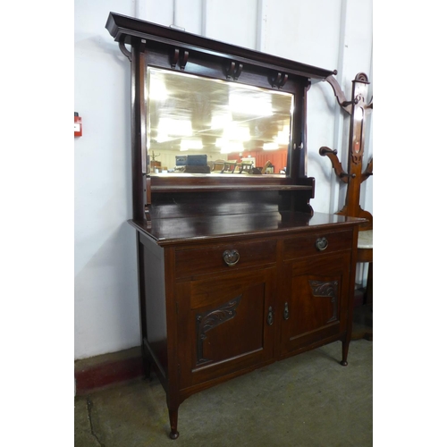 54a - An Arts and Crafts mahogany mirrorback sideboard