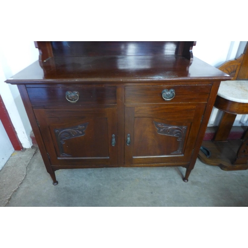 54a - An Arts and Crafts mahogany mirrorback sideboard