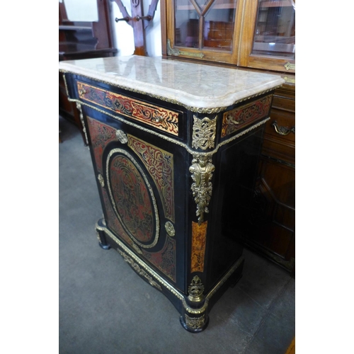 55 - A French Boulle style ebonised and marble topped pier cabinet