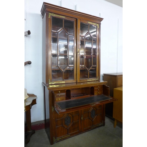 56 - A Victorian walnut secretaire bookcase