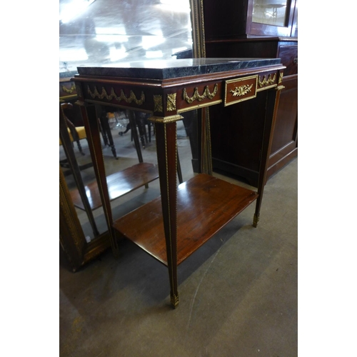 64 - A French Empire style mahogany, gilt metal and marble topped table