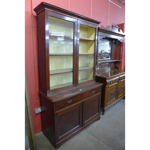 67 - A Victorian mahogany bookcase (lacking one glass pane to door)