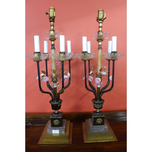 73 - A pair of Italian style gilt metal, marble and floral encrusted table lamps