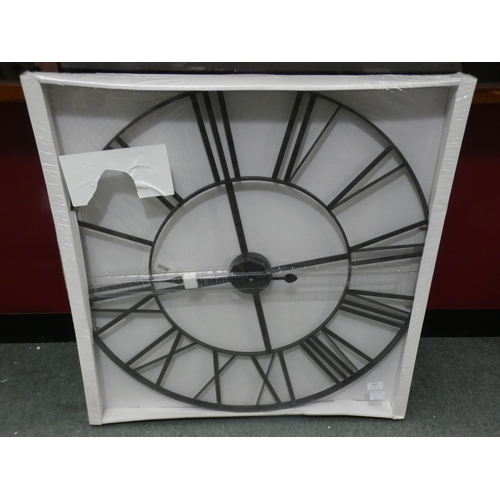 3047 - A large black metal numeral wall clock (80cm diameter) * this lot is subject to VAT