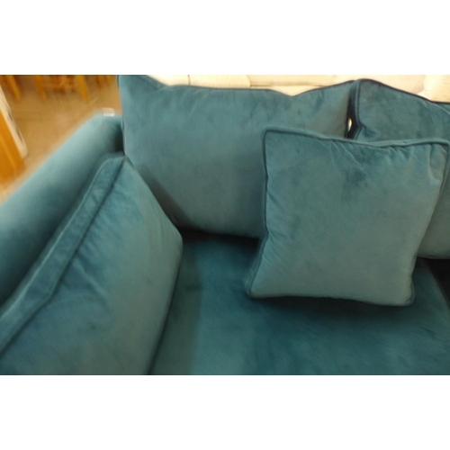 1301 - A teal blue upholstered three seater sofa (Ex display)