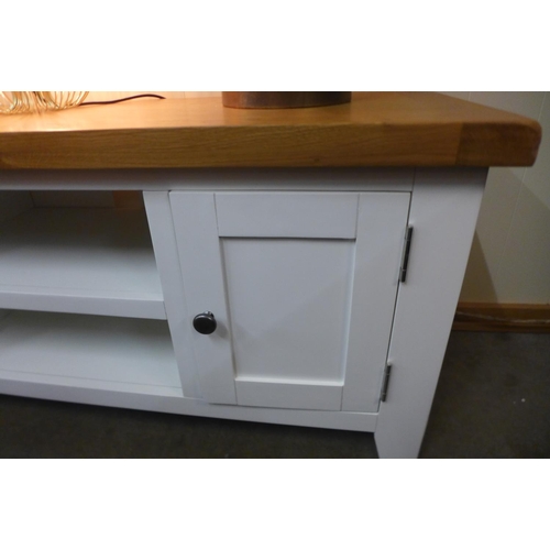 1444 - A Suffolk white painted oak large TV unit (TT-LTV-W)  *this lot is subject to VAT Damage to right ha... 