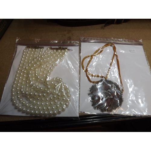 2132 - 70 Large costume jewellery necklaces, carded and bagged