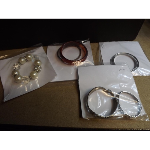 2133 - 50 Costume jewellery bracelets, carded & bagged