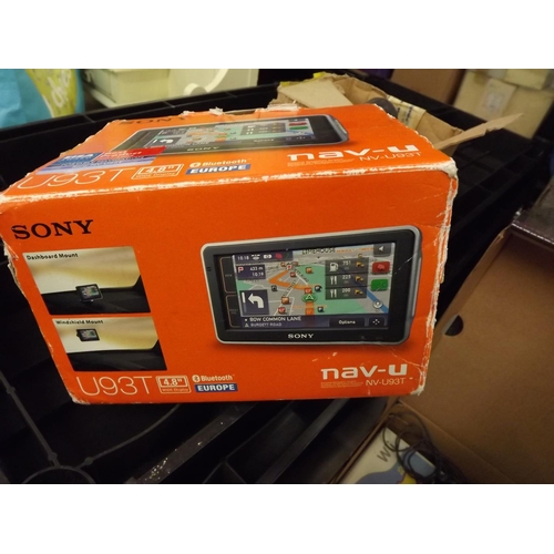 2165 - Sony Nav-U (model NV U93T) portable navigation unit, boxed with a Nintendo Wii console and games