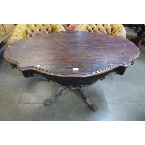 109 - A 19th Century French rosewood two drawer serpentine centre table