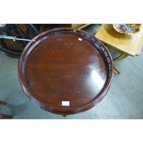 99 - A Chippendale Revival mahogany gallery top tripod table
