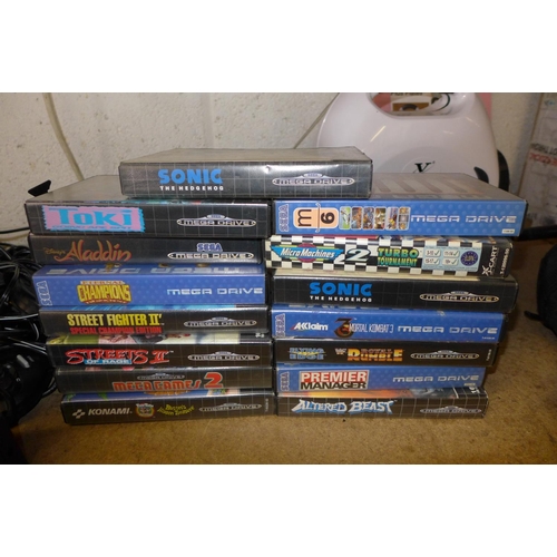 2136 - 2 Sega Mega Drive, 2 consoles, 6 controllers, assorted cables with 15 boxed games & 6 loose games