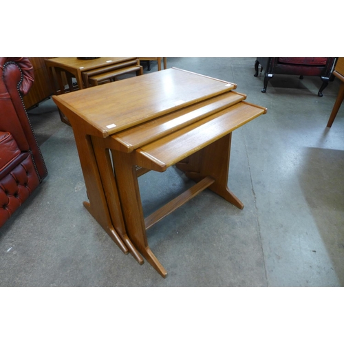 66 - A teak nest of tables