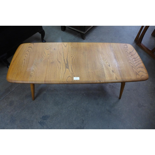 82 - An Ercol Blonde elm Windsor coffee table