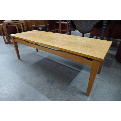 95 - A teak coffee table