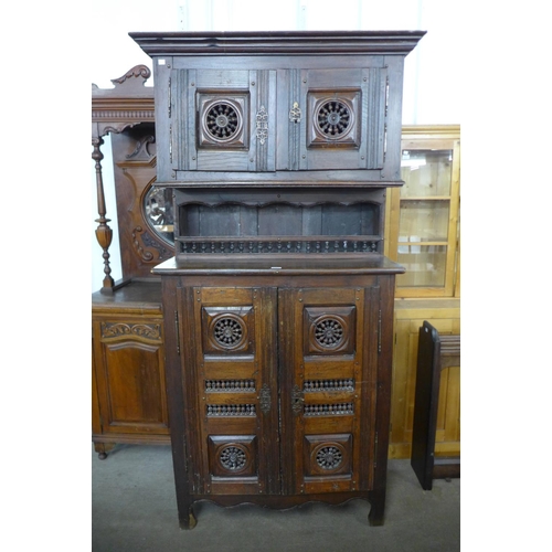 142 - A 19th Century French elm housekeeper's cupboard