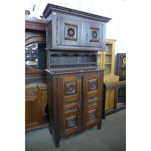 142 - A 19th Century French elm housekeeper's cupboard