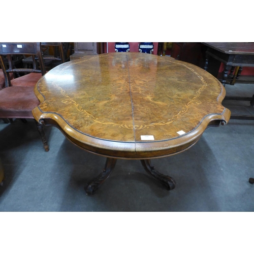 148 - A Victorian inlaid burr walnut serpentine breakfast table