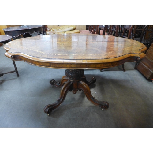 148 - A Victorian inlaid burr walnut serpentine breakfast table