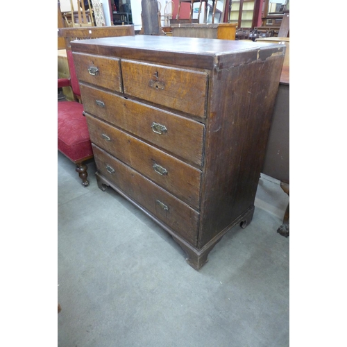 184 - A George III oak chest of drawers