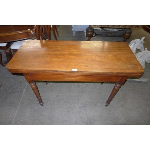 189 - A Victorian mahogany fold over tea table