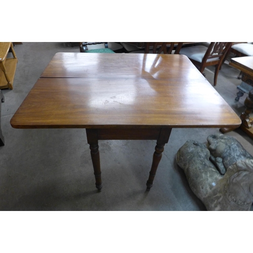 189 - A Victorian mahogany fold over tea table