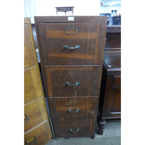 175 - An oak filing cabinet