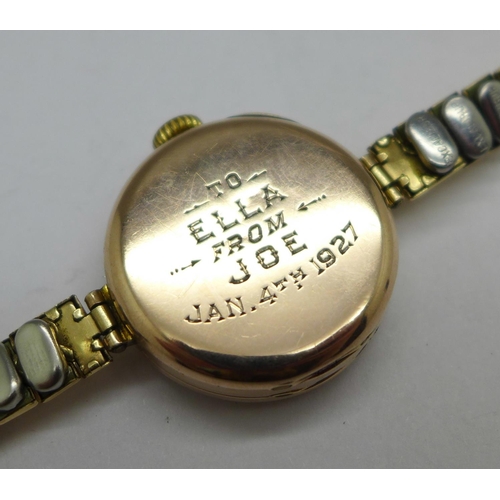 1002 - A 9ct gold cased lady's Rolex 15 jewels wristwatch, the movement and dial marked Rolex, the case bac... 