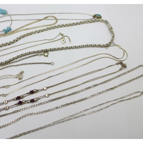 1033 - A collection of silver chains, some fasteners a/f