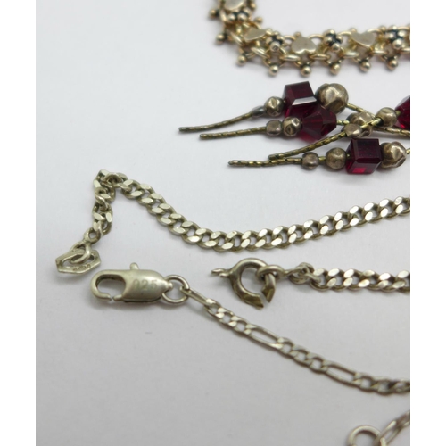 1033 - A collection of silver chains, some fasteners a/f