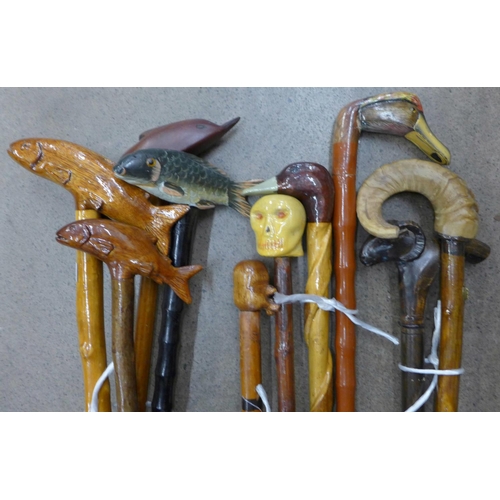 1102 - A collection of walking sticks including duck and fish handles **PLEASE NOTE THIS LOT IS NOT ELIGIBL... 