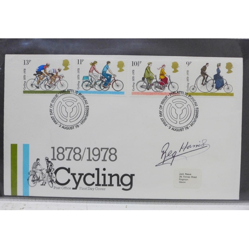 676 - Two folders of Cycling first day covers, including some signed, including Tony Doyle and Reg Harris,... 