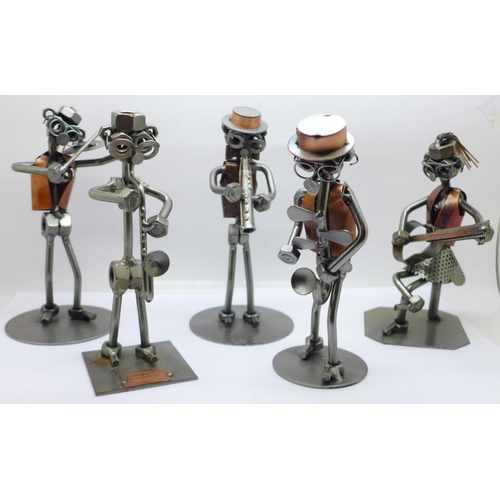 693 - A collection of metal band figures by Hinz and Kunst