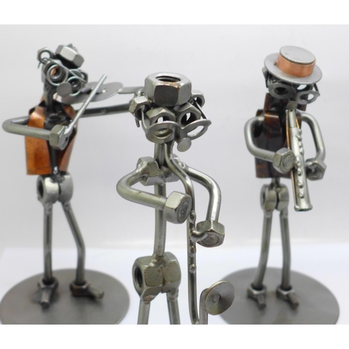 693 - A collection of metal band figures by Hinz and Kunst