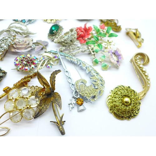 701 - Thirty-six costume brooches including filigree and two scarf clips