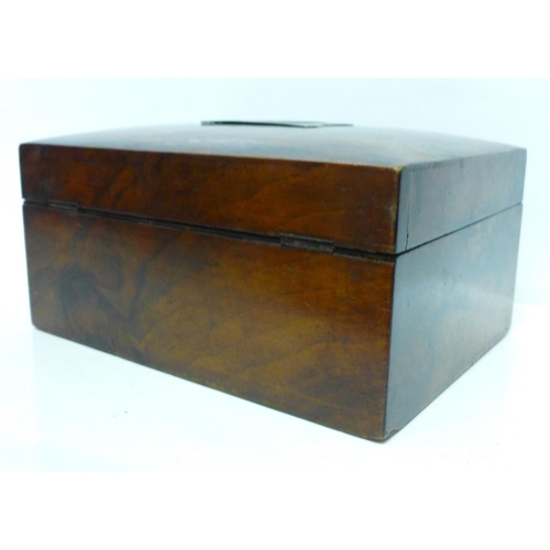 706 - A mid 19th Century walnut veneered sewing box, lacking liner